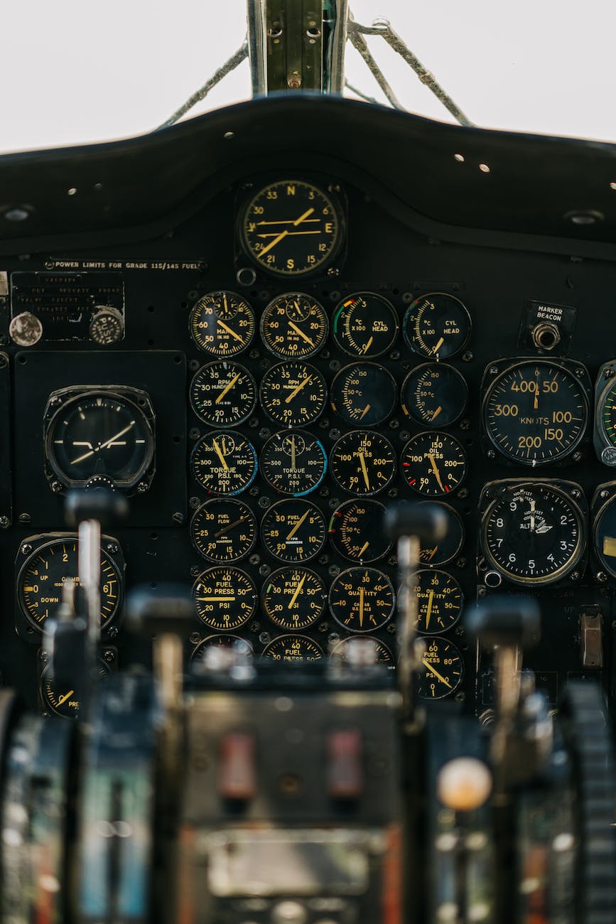 panel with gauges in cockpit of airplane