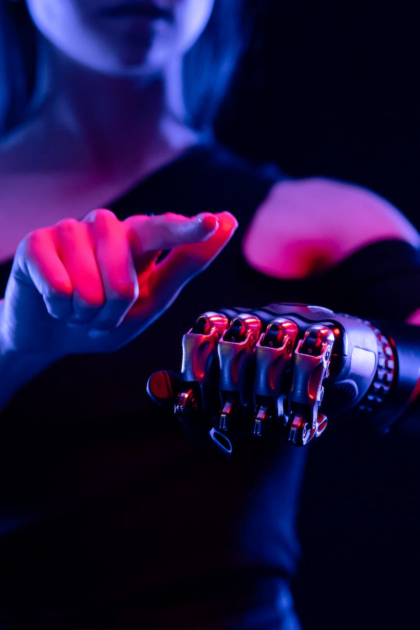 woman pointing finger on bionic hand